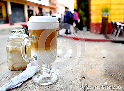 Drinking coffee outside in the city Stock Photo