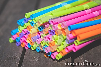 Drinking straws closeup, colorful plastic straw macro Stock Photo