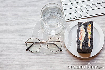 drinking water with charcoal sanwiches Stock Photo