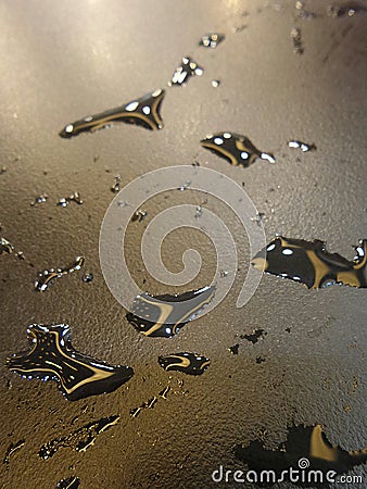 Drinking water spilt on table Stock Photo