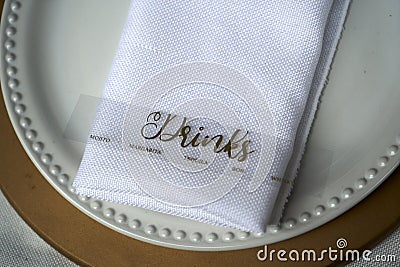 Drinks menu over white plate and napkin Stock Photo