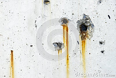 Rusty metal staining on white concrete wall surface Stock Photo