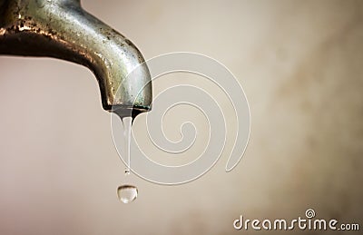 Dripping faucet. In water d'times of crisis it is important to s. Stock Photo