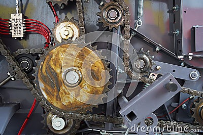 The drive chain and sprockets coated with lubricant Stock Photo