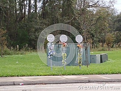 Drive safely markers with flowers Stock Photo