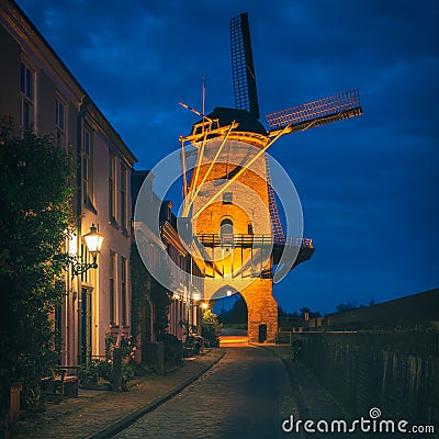Drive Through Windmill in Wijk bij Duurstede Netherlands at Dusk Stock Photo
