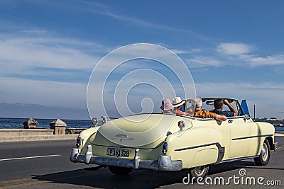 Drive in vintage car over MalecÃ³n, Havana, Cuba Editorial Stock Photo