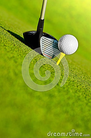 Driver and ball on tee Stock Photo