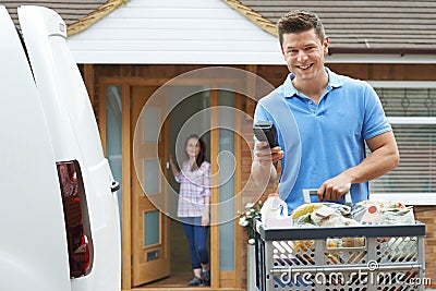 Driver Delivering Online Grocery Order Stock Photo