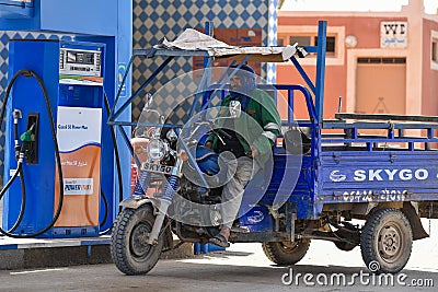 Driver in filling station, Morocco Editorial Stock Photo