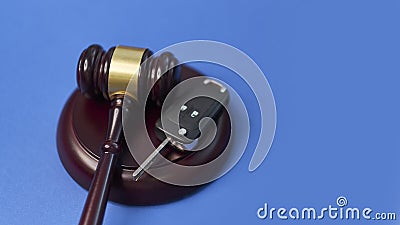 Driver license revocation concept next to the judge hammer. Traffic violation concept by car next to judge hammer Stock Photo