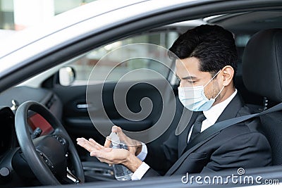 Driver Pouring Sanitizer On Hand Stock Photo