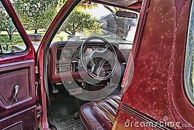 Front seat of a junked truck Stock Photo