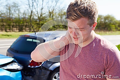 Driver Suffering From Whiplash After Traffic Collision Stock Photo