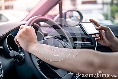 Driver using mobile app for GPS navigation Stock Photo