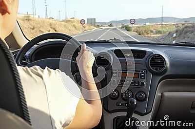 Driver woman getting close to overtaking forbidden road section Stock Photo