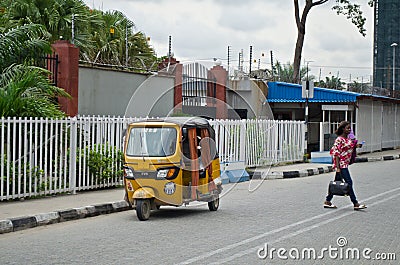 Drivers of yellow tuk tuks ply their trade around the port city Editorial Stock Photo