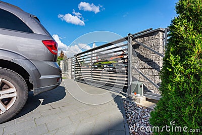 Driveway with an automatic gate Stock Photo