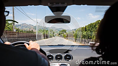 Driving a car in country region in Sicily Stock Photo