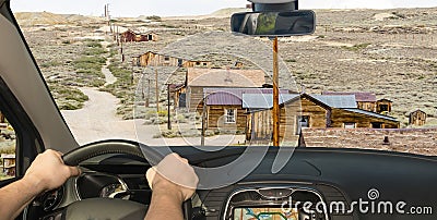 Driving a car in ghost town of Bodie, California, USA Stock Photo
