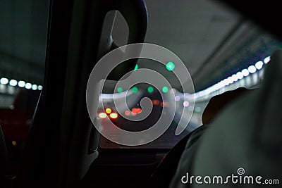 Driving car at night through a tunnel Stock Photo