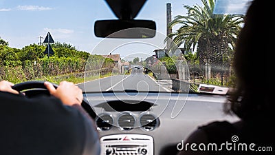 Driving a car in rural region in summer Stock Photo