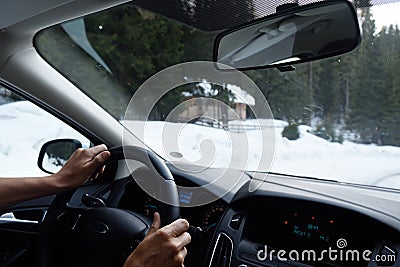 Driving a car in the snow photo from Stock Photo