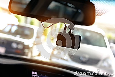 Driving car with video camera record technology Stock Photo