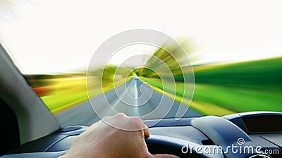 Driving a fast car POV Stock Photo