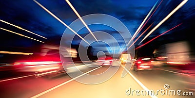 Driving on the highway at night Stock Photo