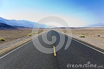 Driving on the Interstate 187 in Death valley Stock Photo