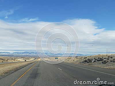 Driving Landscape Wyoming Stock Photo