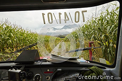 Car windscreen road corn field Stock Photo