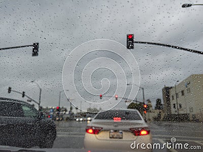 Driving in the rainy Los Angeles urban Stock Photo