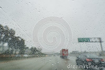 Driving in the rainy Los Angeles urban Stock Photo