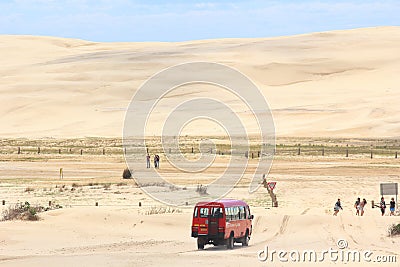 Driving by bus into sand dune landscape Editorial Stock Photo