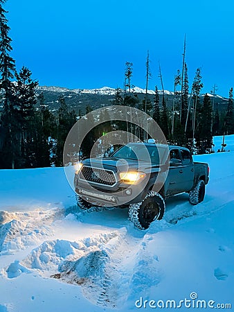 Driving on Snow in Blue Hour Editorial Stock Photo