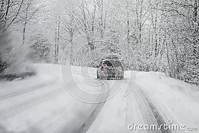 Driving in snowstorm Stock Photo