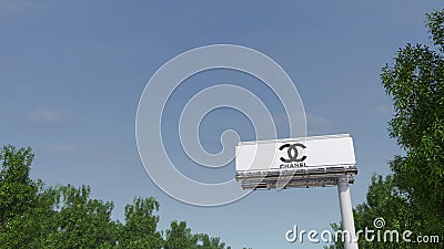 Driving towards advertising billboard with Chanel logo. Editorial 3D rendering Editorial Stock Photo