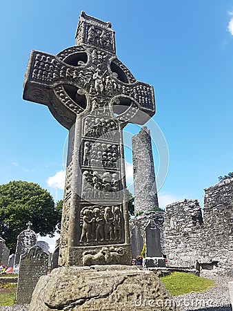 Drogheda, IRELAND - August 5h, 2019: Celtic High Cross in the historic ruins of Monasterboice, an early Christian settlement near Editorial Stock Photo