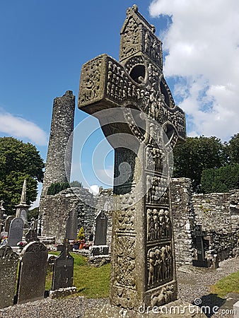Drogheda, IRELAND - August 5h, 2019: Celtic High Cross in the historic ruins of Monasterboice, an early Christian settlement near Editorial Stock Photo
