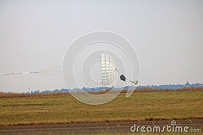 DROGUE CHUTE TRAILING BEHIND HAWK JET AFTER LANDING Stock Photo