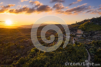 Drone aerial panorama of Termas Radium Hotel Serra da Pena at sunset in Sortelha, Portugal Stock Photo