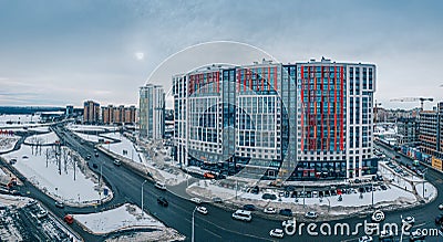 Drone aerial view of a residential highrise building in modern city district with busy road and Editorial Stock Photo