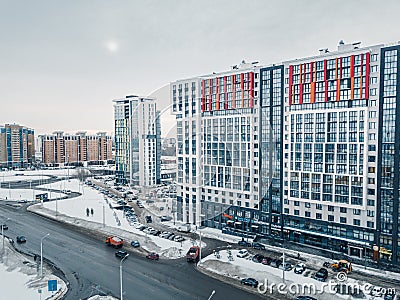 Drone aerial view of a residential highrise building in modern city district with busy road and Editorial Stock Photo