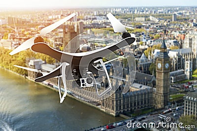 Drone with digital camera flying over London Stock Photo