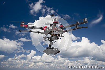 Drone flying in the clouds Stock Photo