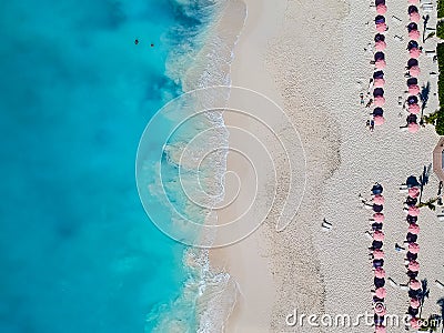 Drone photo of beach with red umbrellas in Grace Bay, Providenciales, Turks and Caicos Stock Photo