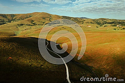 Drone photography of winding road through beautiful Zlatibor mountain landscape Stock Photo