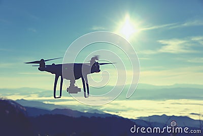 Drone pilotage at sunrise. Stock Photo